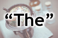 “The”という文字と地球儀の画像